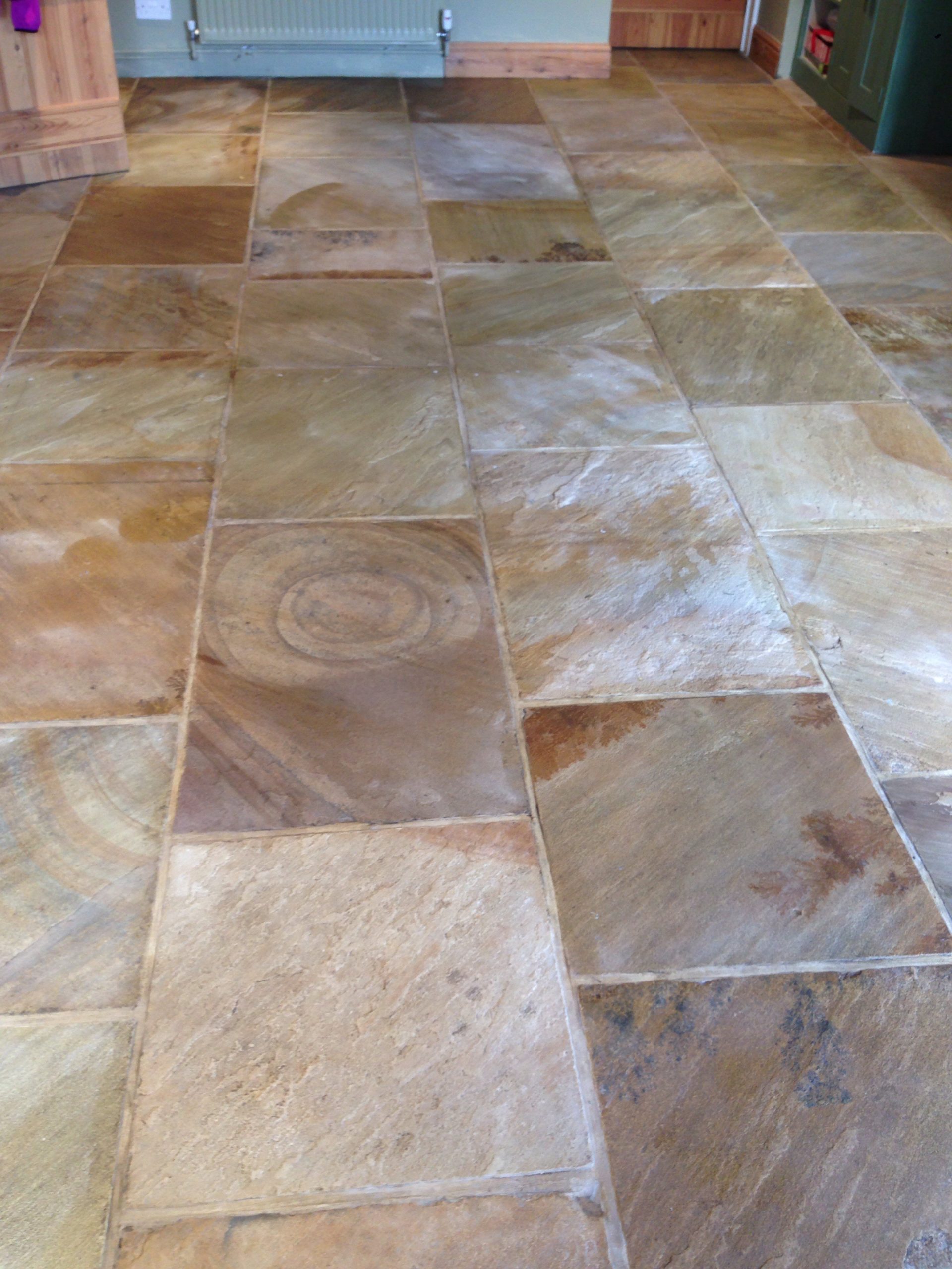 Restored York stone floor tiles